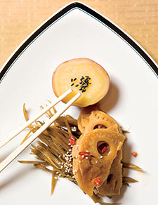 A kimpira plate of lotus root and burdock sprinkled with dried red chillies